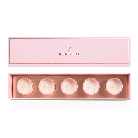 HighOnLove Mini Sensual Massage Candles collection with five soy candles in a pink box for intimate massage and relaxation