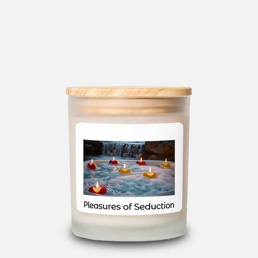 Frosted glass candle with wooden lid featuring "Pleasures of Seduction" label, natural off-white coconut soy wax blend, 11 oz size.